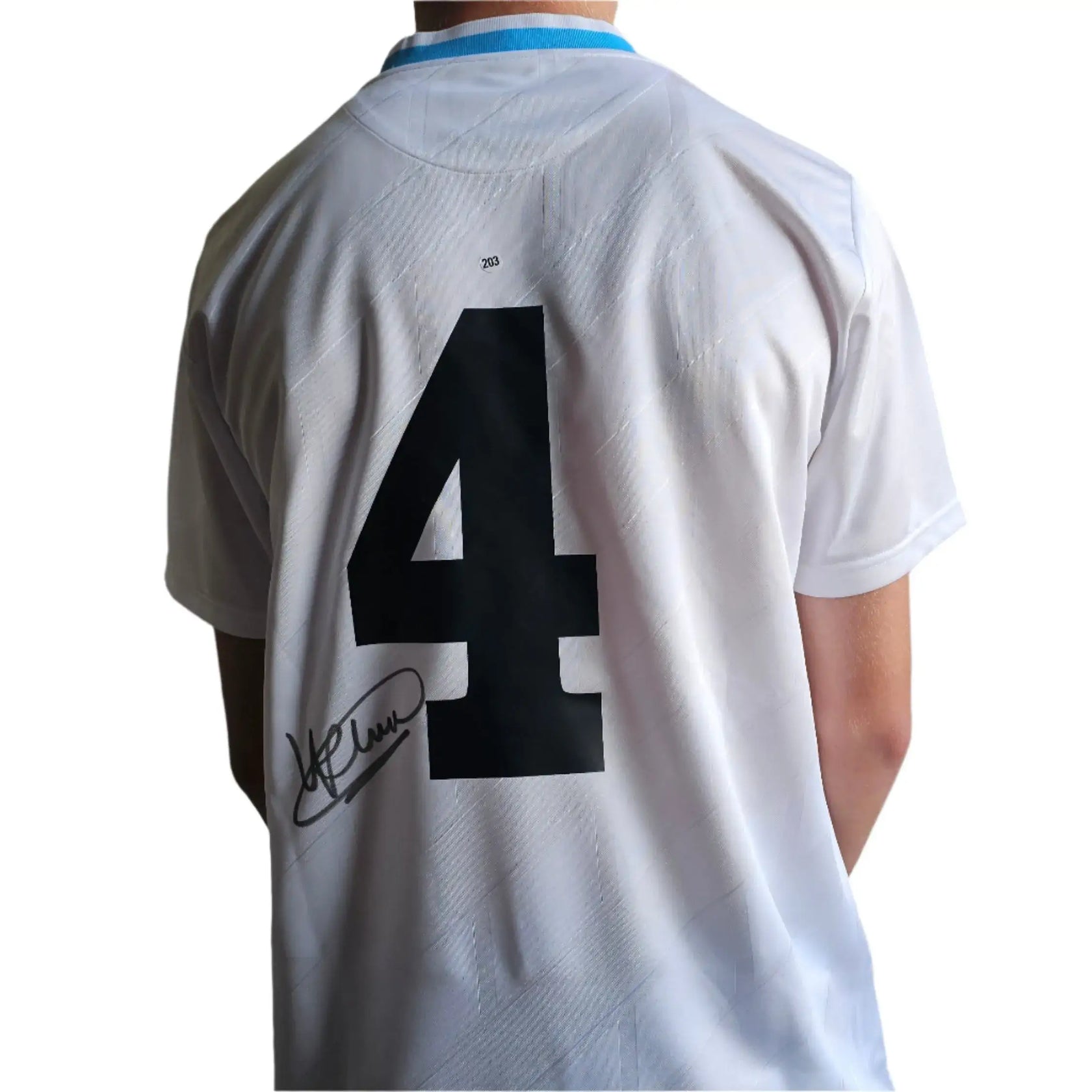 Back view featuring No. 4 and signature of Ronald Koeman on white football shirt.
