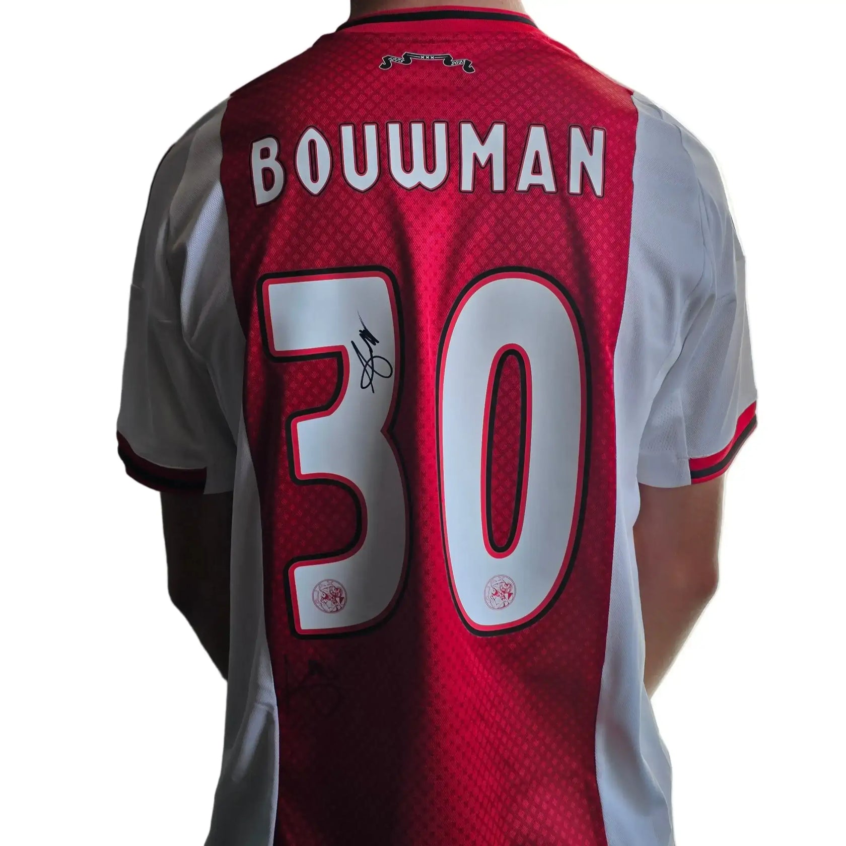Back view of the Ajax shirt featuring 'BOUWMAN', No. 30, and a visible signature.