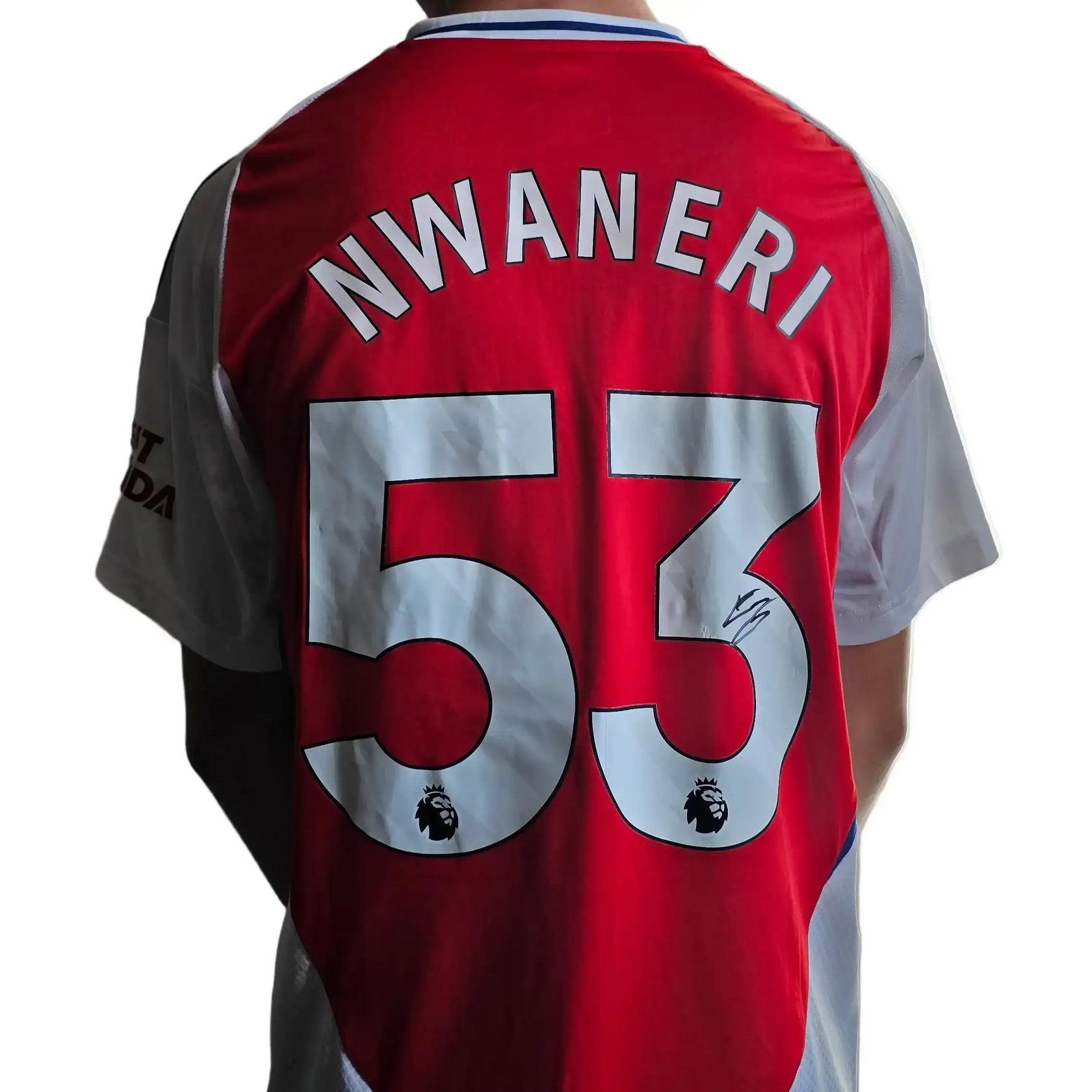 Back view of red Arsenal shirt featuring Nwaneri's name and No. 53, with a visible signature.