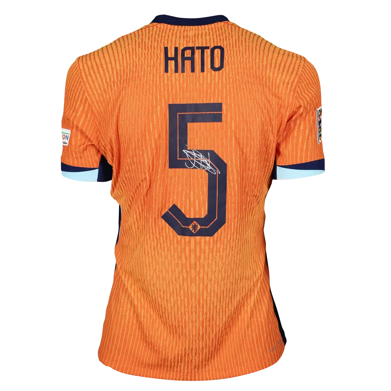 Back view showing player name HATO, number 5, and signature in orange football shirt.