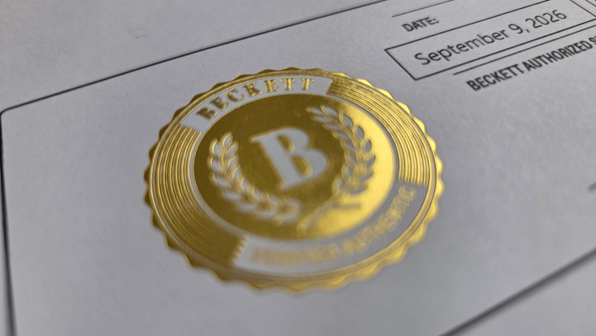 An embossed gold Beckett seal on a Letter of Authenticity, beside a printed date field reading September 9, 2026. The seal and the letter are a record that needs no website, and the date is the day Beckett's platforms went offline.