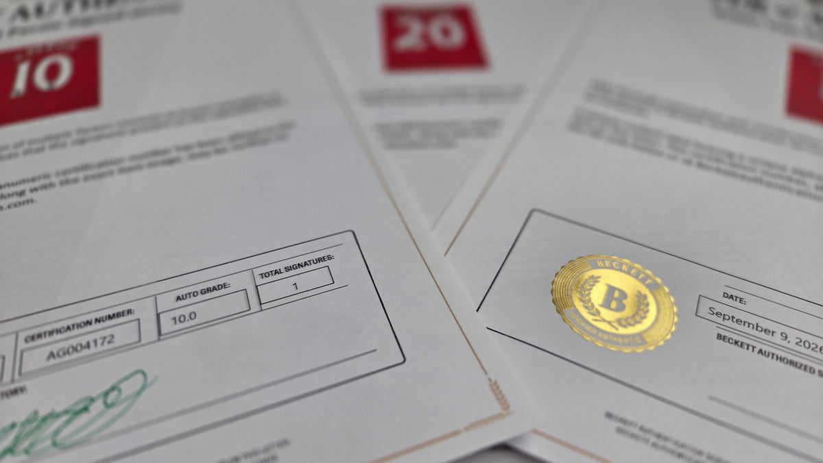 Overlapping Beckett certificates and an embossed gold seal, photographed close up. Paper records like these stay readable whether or not a database is online.