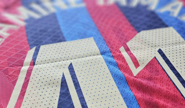 Nike FC Barcelona 2022-2023 home shirt, authentic DRI-FIT ADV fabric with Lamine Yamal name detail printed in white on blue and red textured stripes.