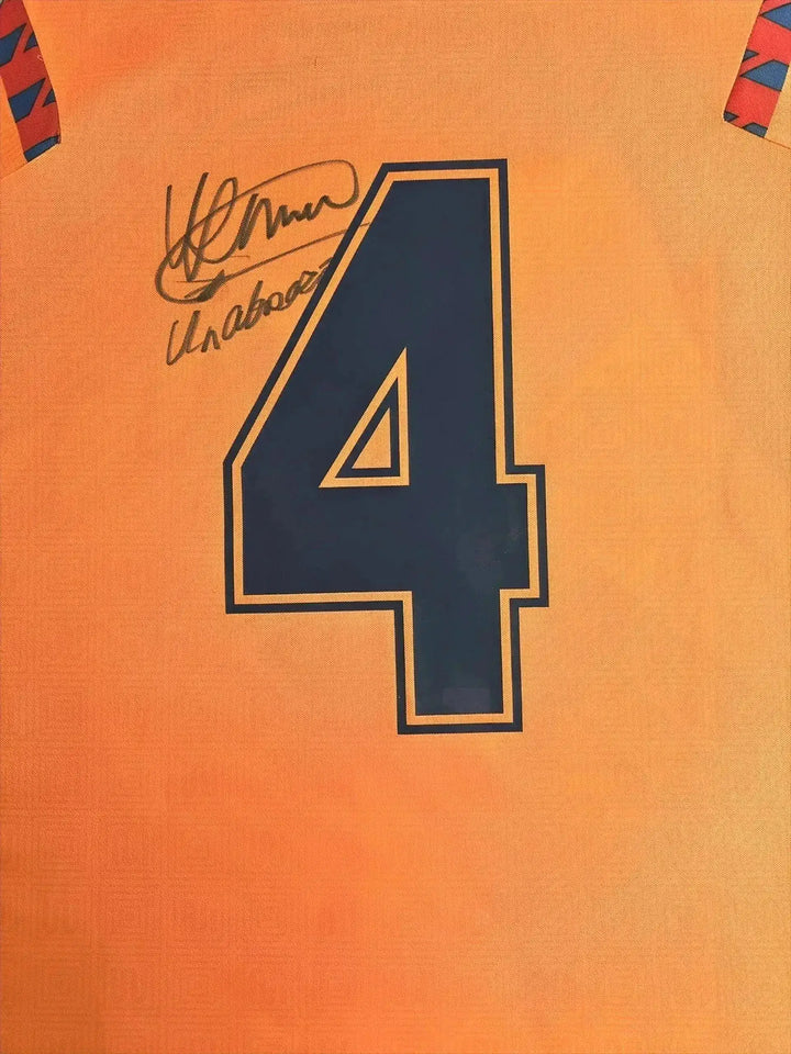 Detail view showing signature and No. 4 on Ronald Koeman&