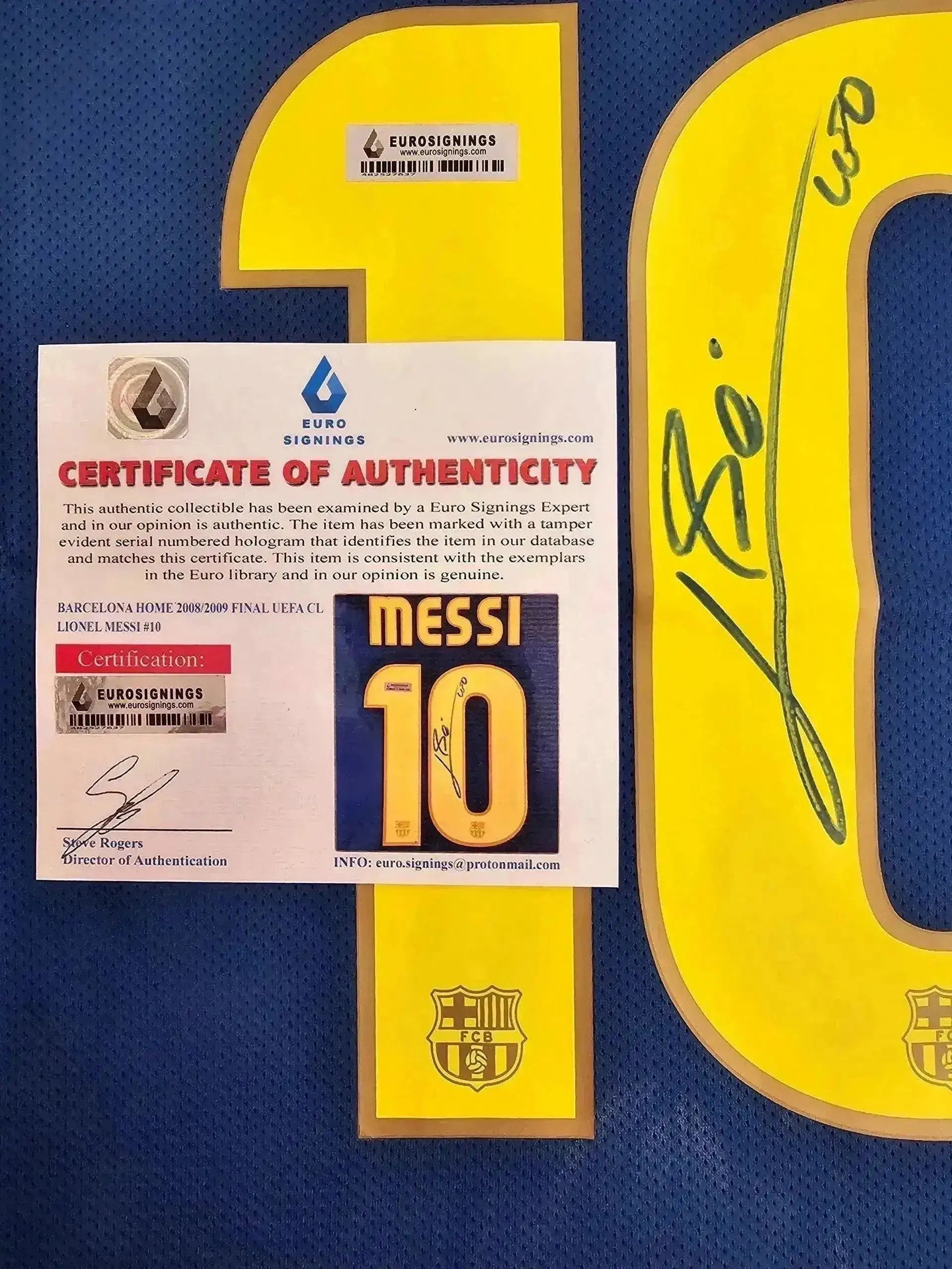 Signed detail with Lionel Messi autograph and certificate of authenticity for No. 10 Barcelona soccer jersey.