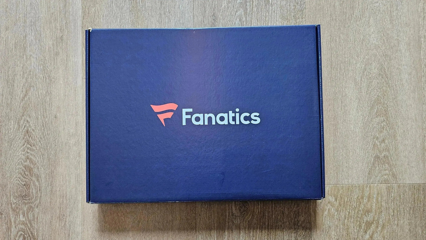 Top view of a fanatics box with 'Fanatics' in blue and red lettering.