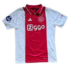 Front view of Brian Brobbey signed Ajax football shirt featuring Ziggo sponsor and crest with three stars.