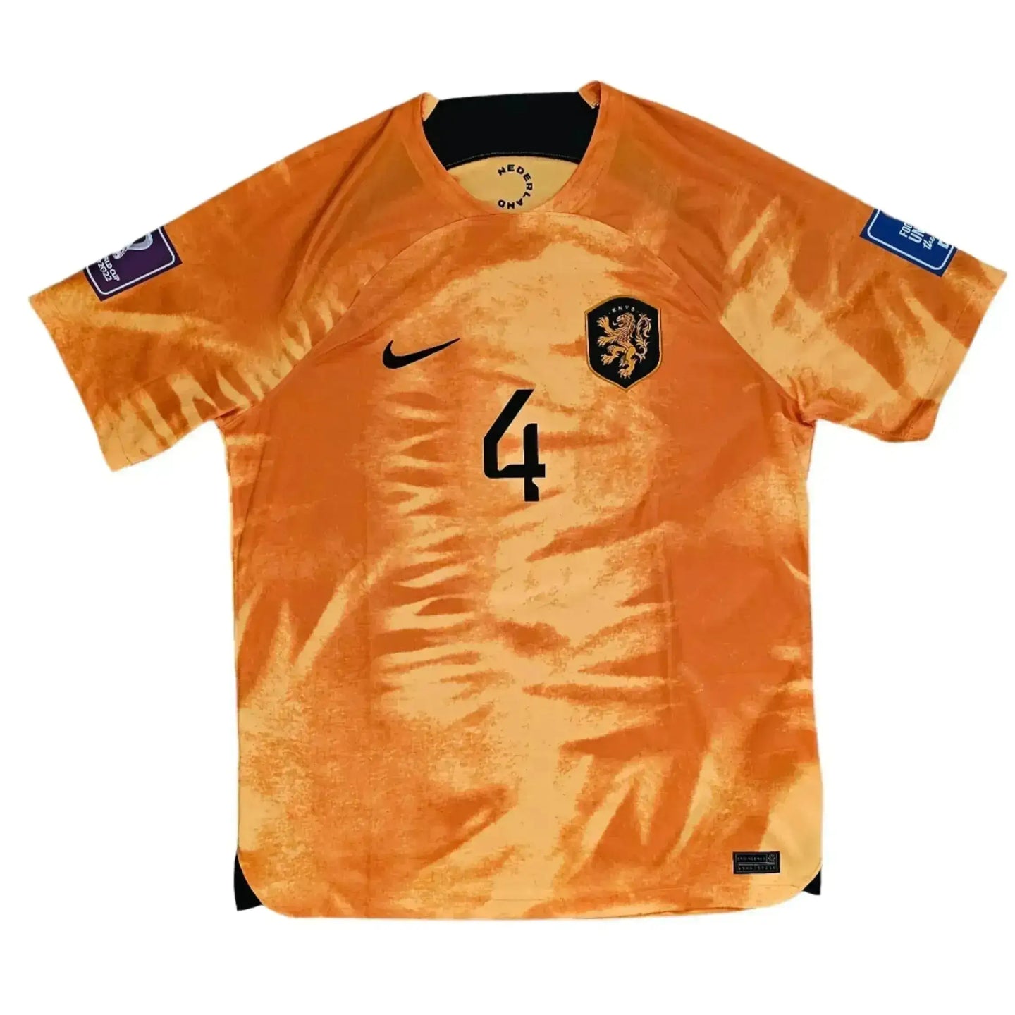 Front view of a signed Holland football shirt featuring player No. 4 and crest.