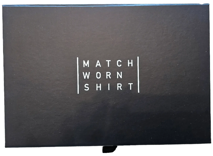 Black box featuring the text &