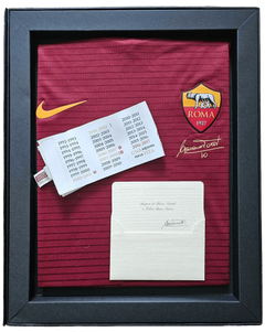 Francesco Totti No. 10 Roma football shirt with signature and commemorative details displayed.