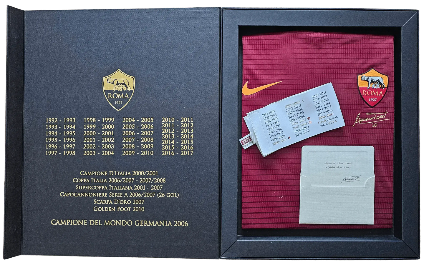 Francesco Totti 10 shirt in red with signature, A.S. Roma crest, and awards details displayed.