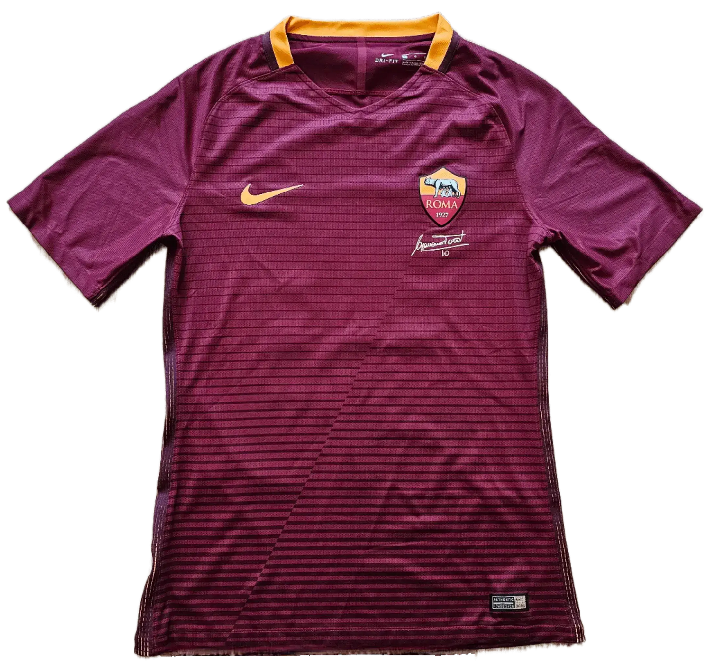Front view of Francesco Totti 10 Roma shirt with signature and club crest.