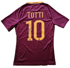 Back view featuring Totti, No. 10, with a visible signature and AS Roma branding.