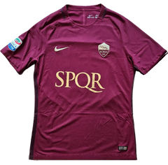 Front view of a maroon football shirt featuring the crest, SPQR text, and Nike logo.