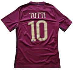 Back view showing No. 10 and signature of Totti on a maroon football shirt.