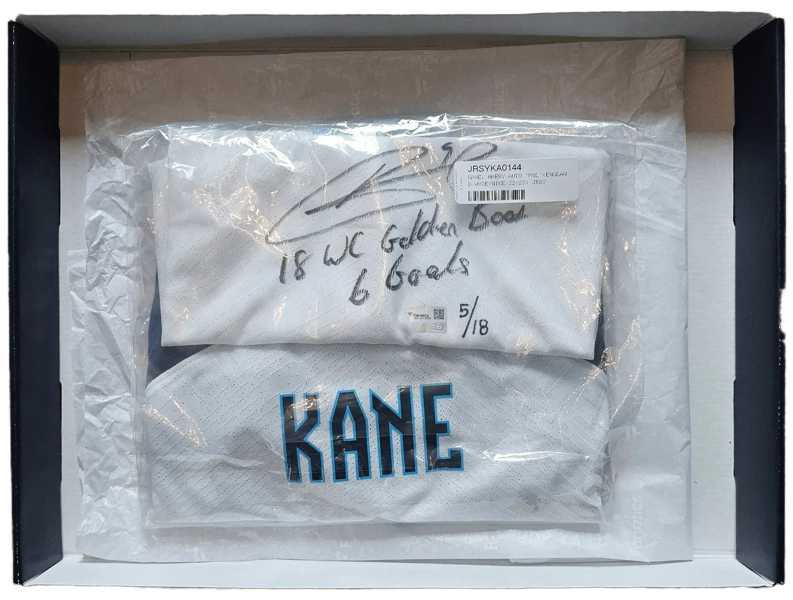 Signature detail showing Harry Kane's autograph and notes about his achievements on the shirt.