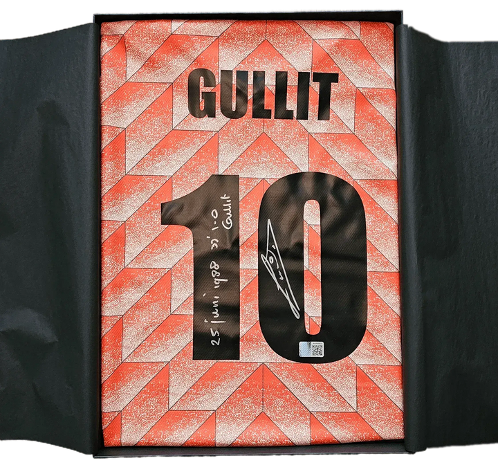 Signed football shirt by Gullit, featuring No. 10 and handwritten signature detail.