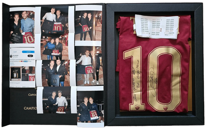 Francesco Totti 10 in gold on a red football shirt with signature, inside a framed farewell box.
