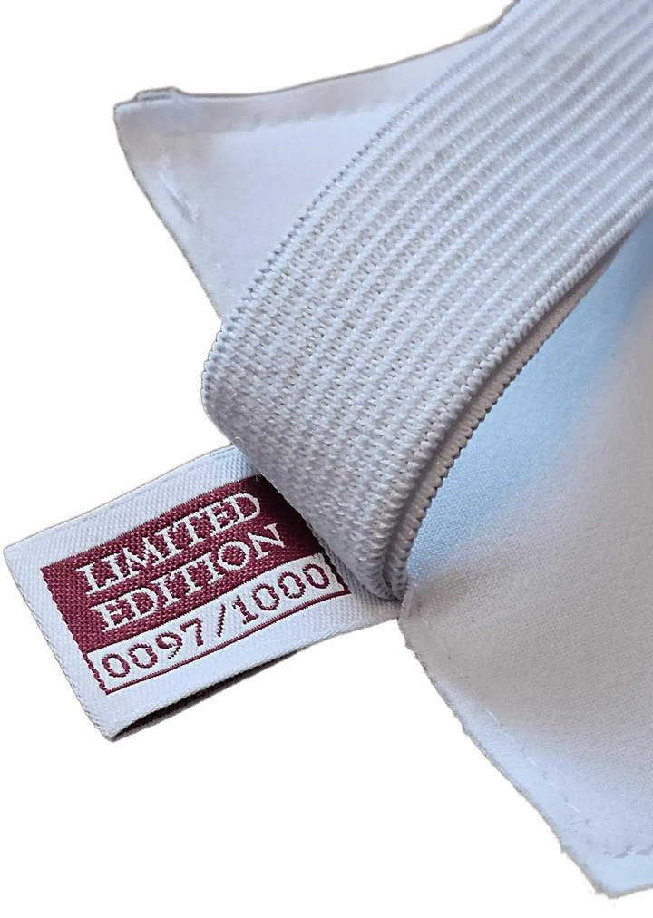 Detail showing 'LIMITED EDITION 0097/1000' tag on the shirt collar.