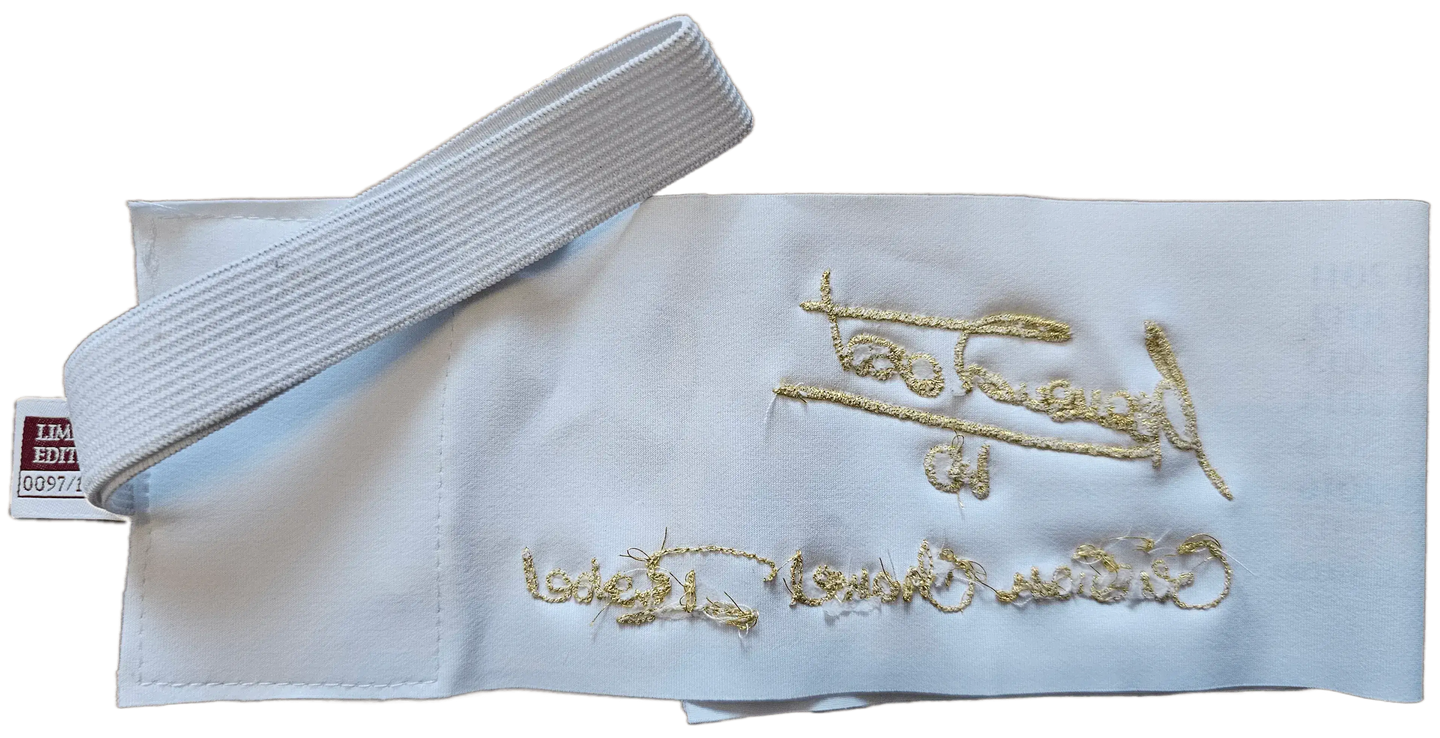Detail of the captains band with Francesco Totti's signature embroidered in gold.
