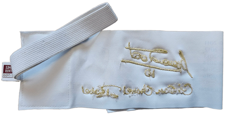 Detail of the captains band with Francesco Totti's signature embroidered in gold.