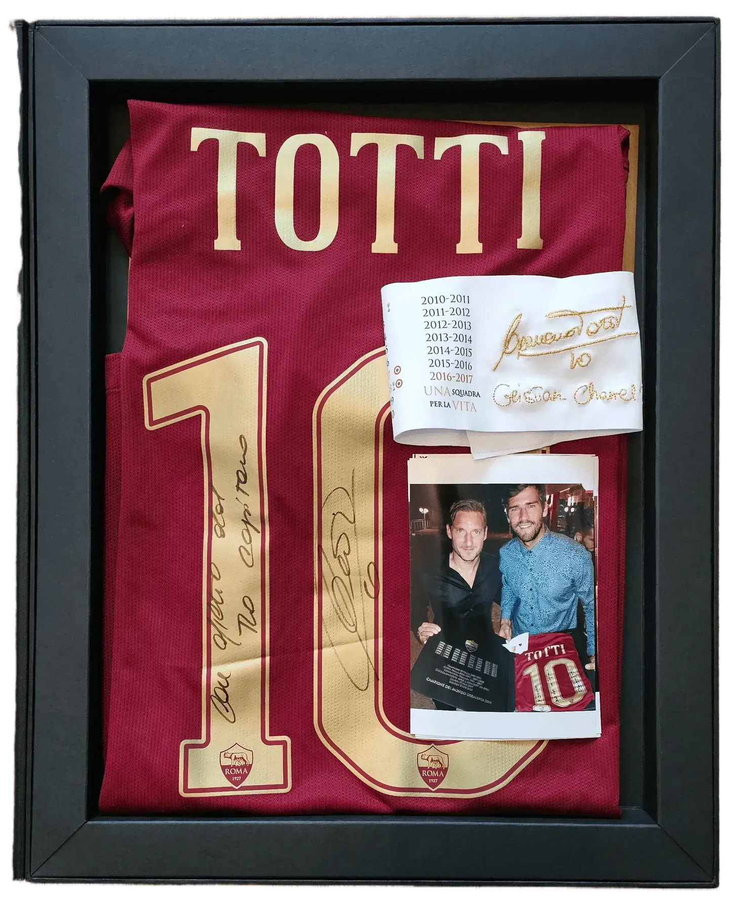 Front view of Francesco Totti 10 football shirt with signature and commemorative tag.