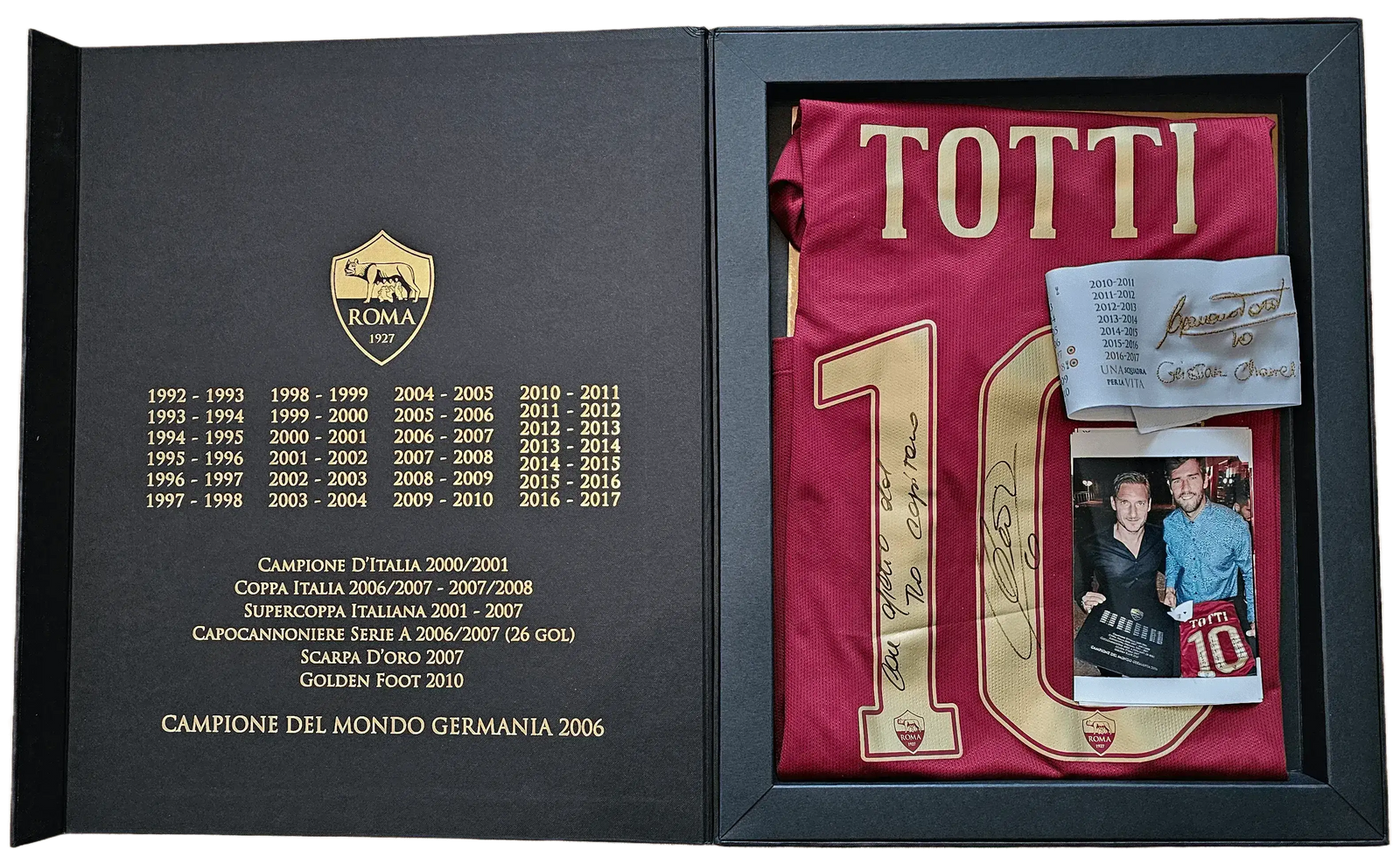 Francesco Totti No. 10 football shirt signed, displayed in presentation box with ROMA crest and achievements listed.