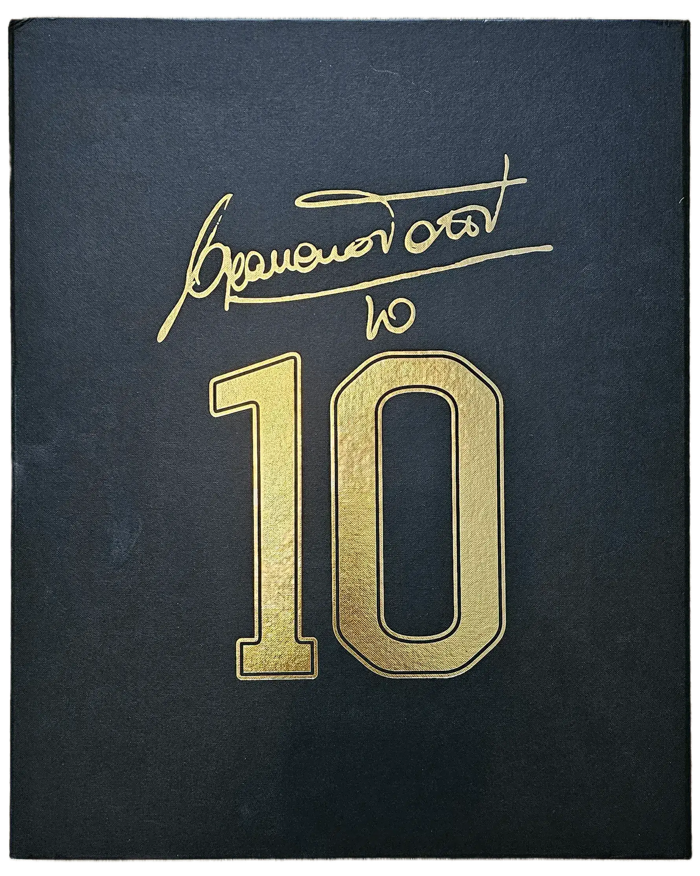 Francesco Totti signature above No. 10 in gold on a black background.