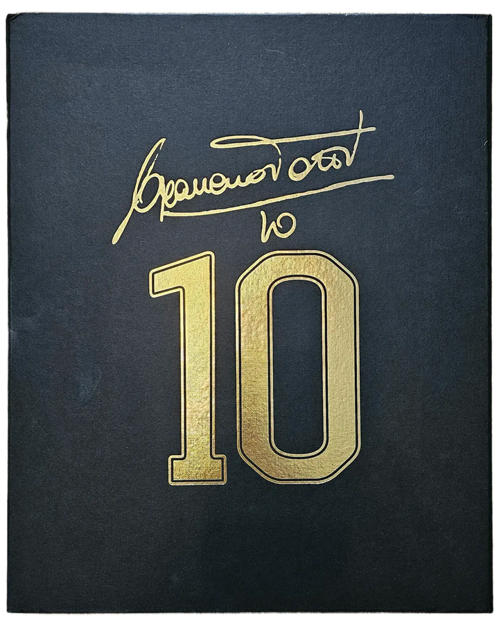 Francesco Totti signature above No. 10 in gold on a black background.
