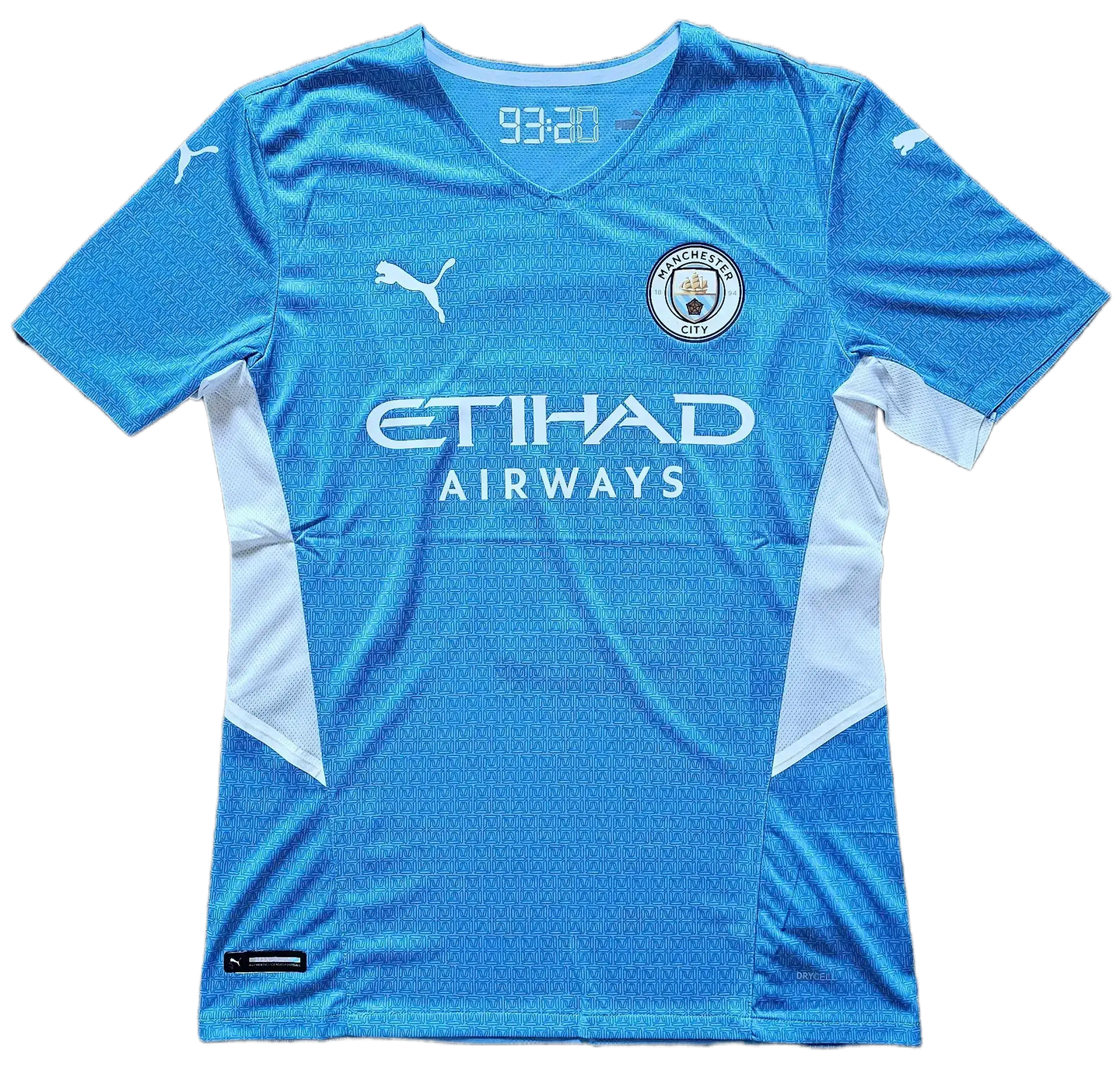 Front view featuring Manchester City crest, ETIHAD AIRWAYS logo, and a background color of sky blue.