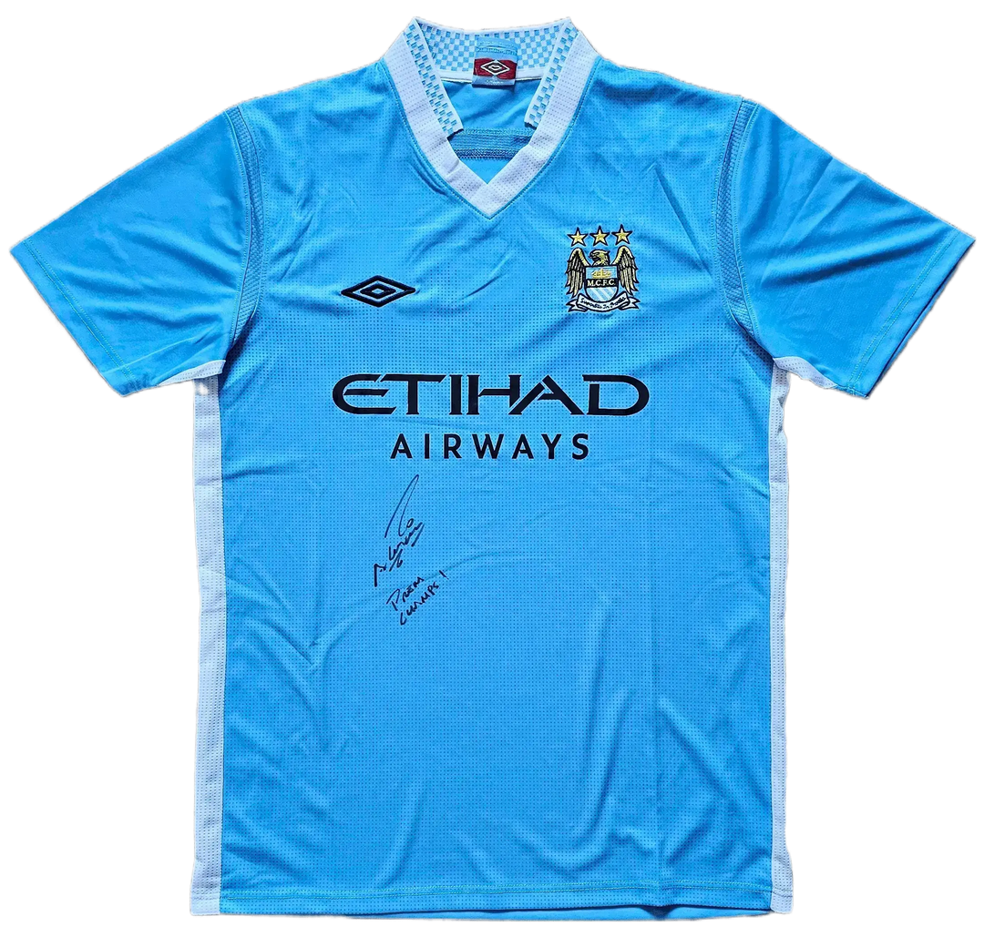 Front view of Manchester City soccer jersey featuring signature and ETIHAD AIRWAYS sponsor.