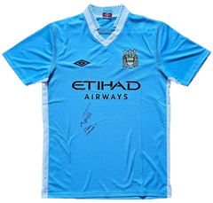 Front view of Manchester City soccer jersey featuring signature and ETIHAD AIRWAYS sponsor.