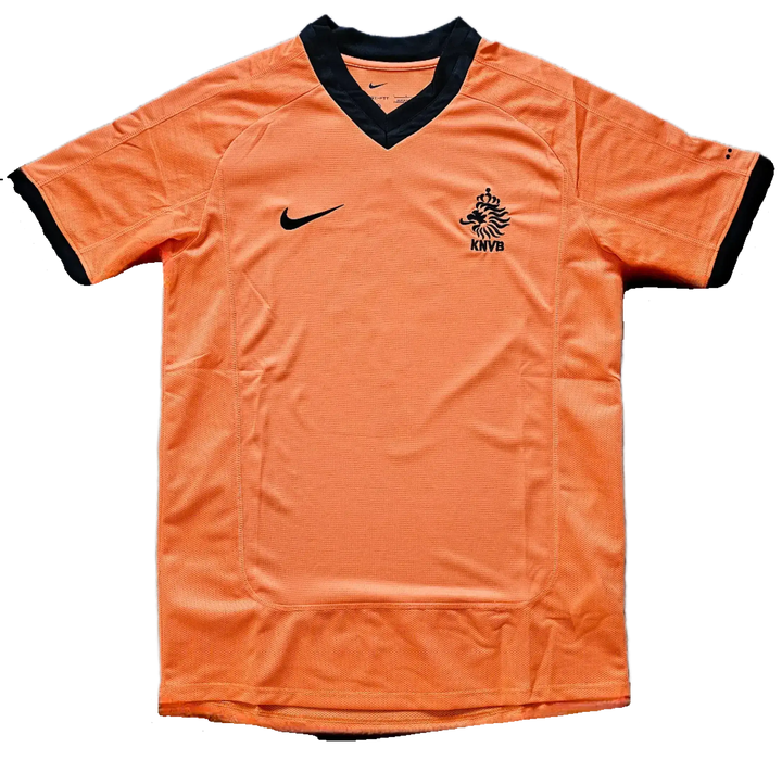 Front view of Patrick Kluivert 9 Holland signed football shirt displaying orange color and KNVB crest.