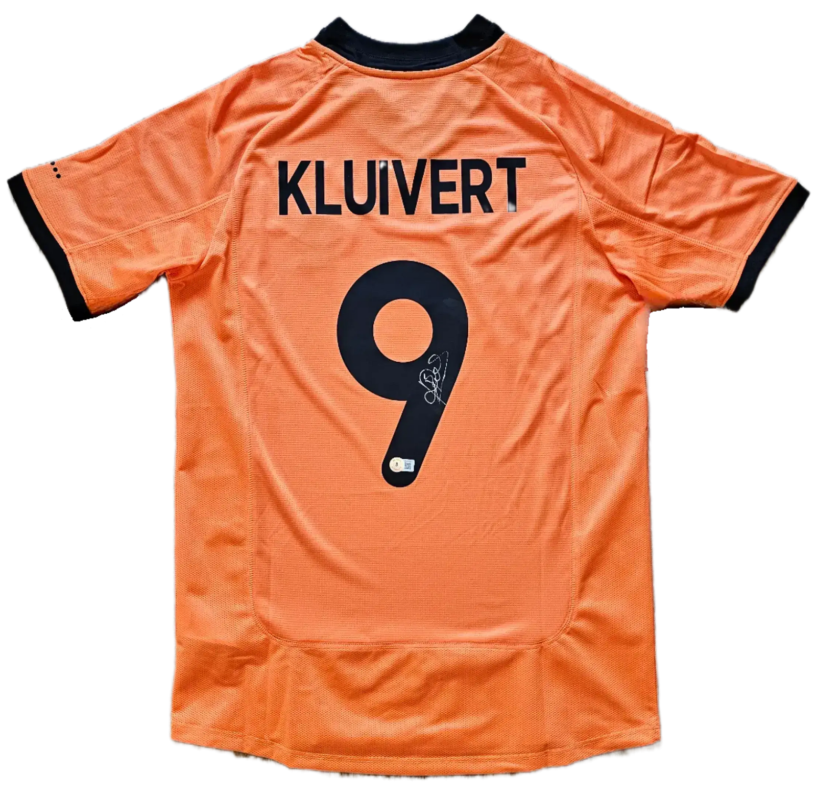 Back view showing KLUIVERT and No. 9, with a visible signature on the shirt.