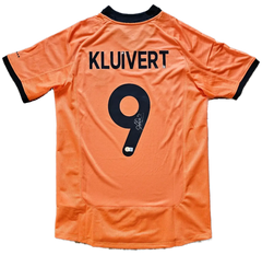 Back view showing KLUIVERT and No. 9, with a visible signature on the shirt.