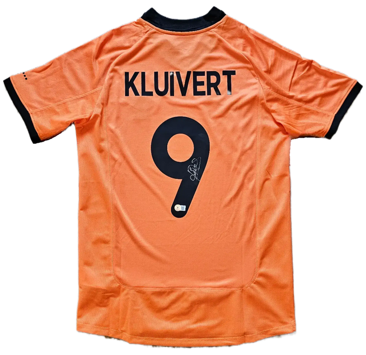 Back view showing KLUIVERT and No. 9, with a visible signature on the shirt.