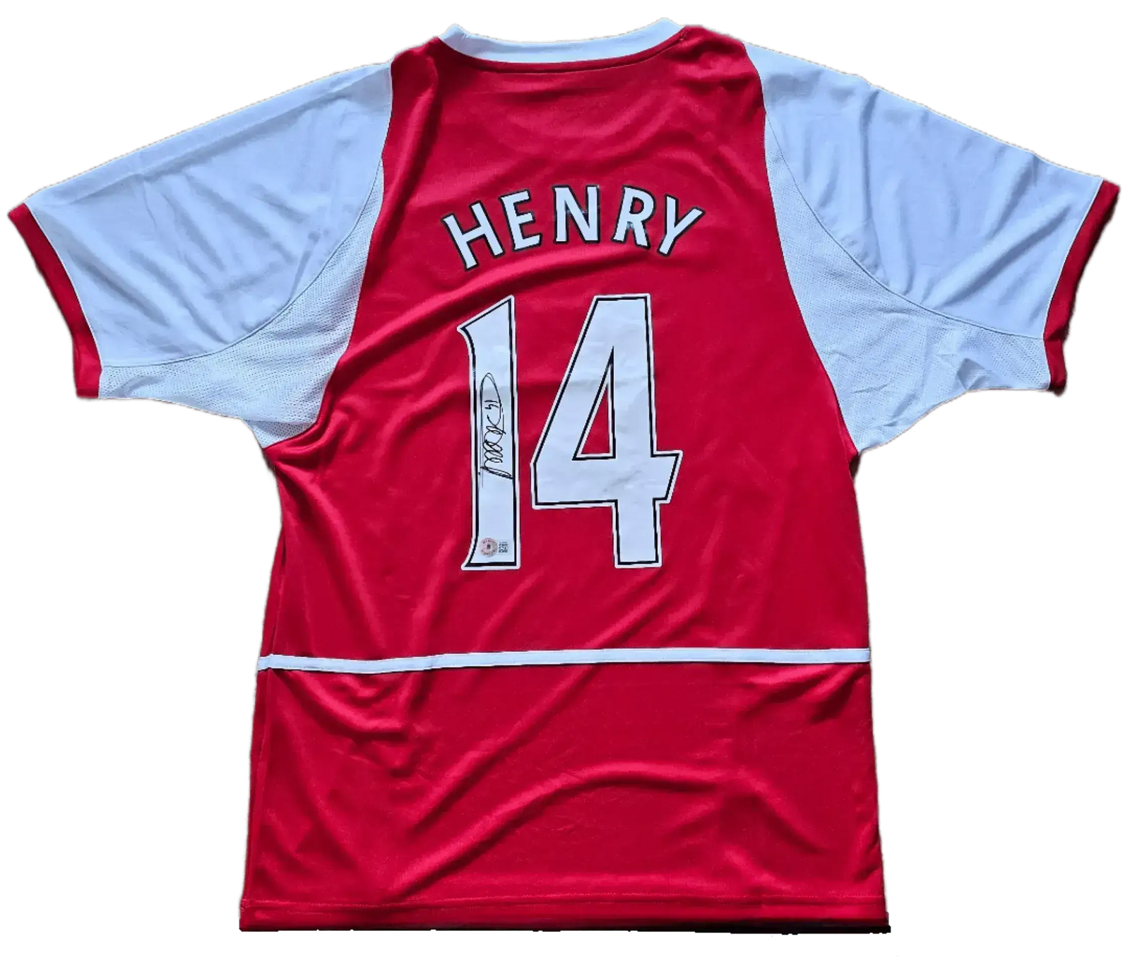 Back view showing No. 14, Henry, and a visible signature on the red soccer jersey.