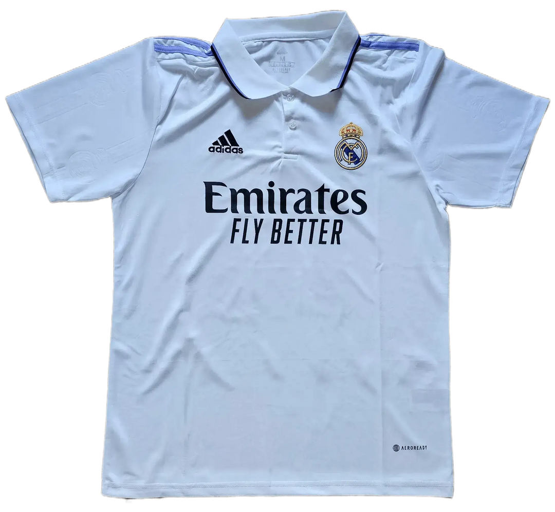 Front view of Real Madrid CF soccer jersey with 'Emirates FLY BETTER' and crest detail.