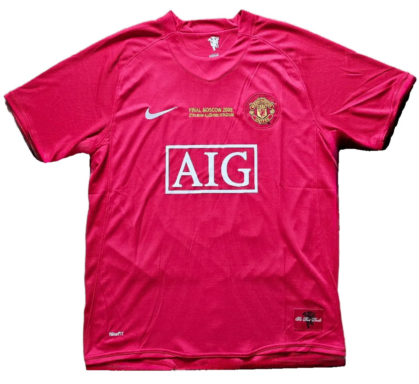Front view of a Manchester United soccer jersey with 'AIG' logo and 'FINAL MOSCOW 2008' text.