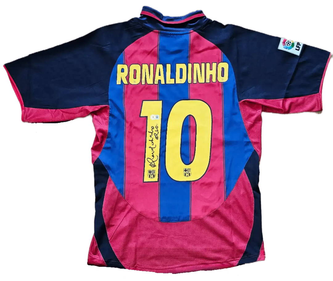 Back view showing Ronaldinho, No. 10, and signature on FC Barcelona shirt.