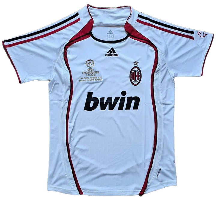 Front view of signed AC Milan football shirt featuring bwin sponsor and Champions League details.