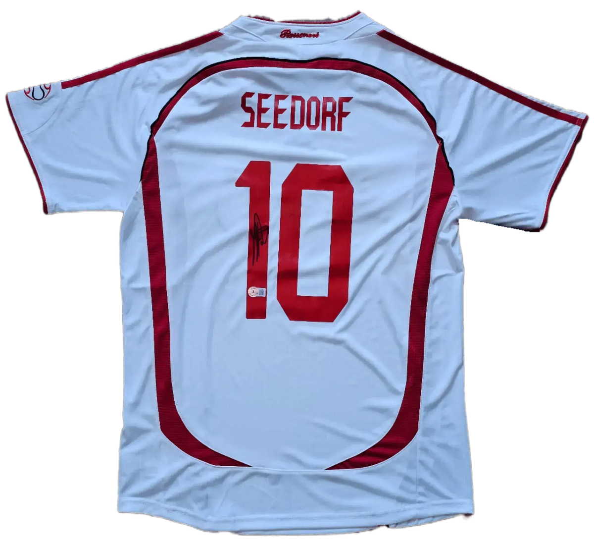 Back view showcasing Seedorf, No. 10, with visible signature on the white AC Milan soccer jersey.