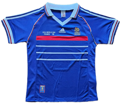 Front view of signed Patrick Vieira 4 France soccer jersey with FIFA World Cup France 98 and adidas logo.