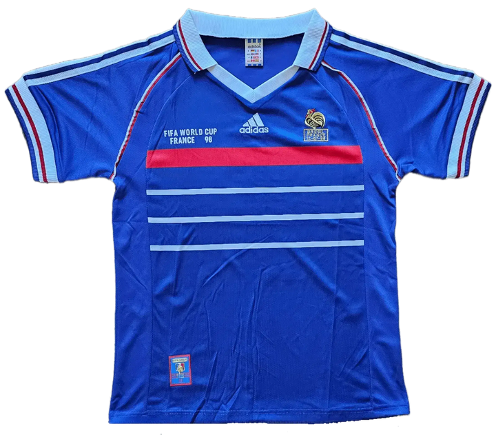 Front view of a signed Robert Pires France 1998 World Cup football shirt featuring blue, red, and white colors.