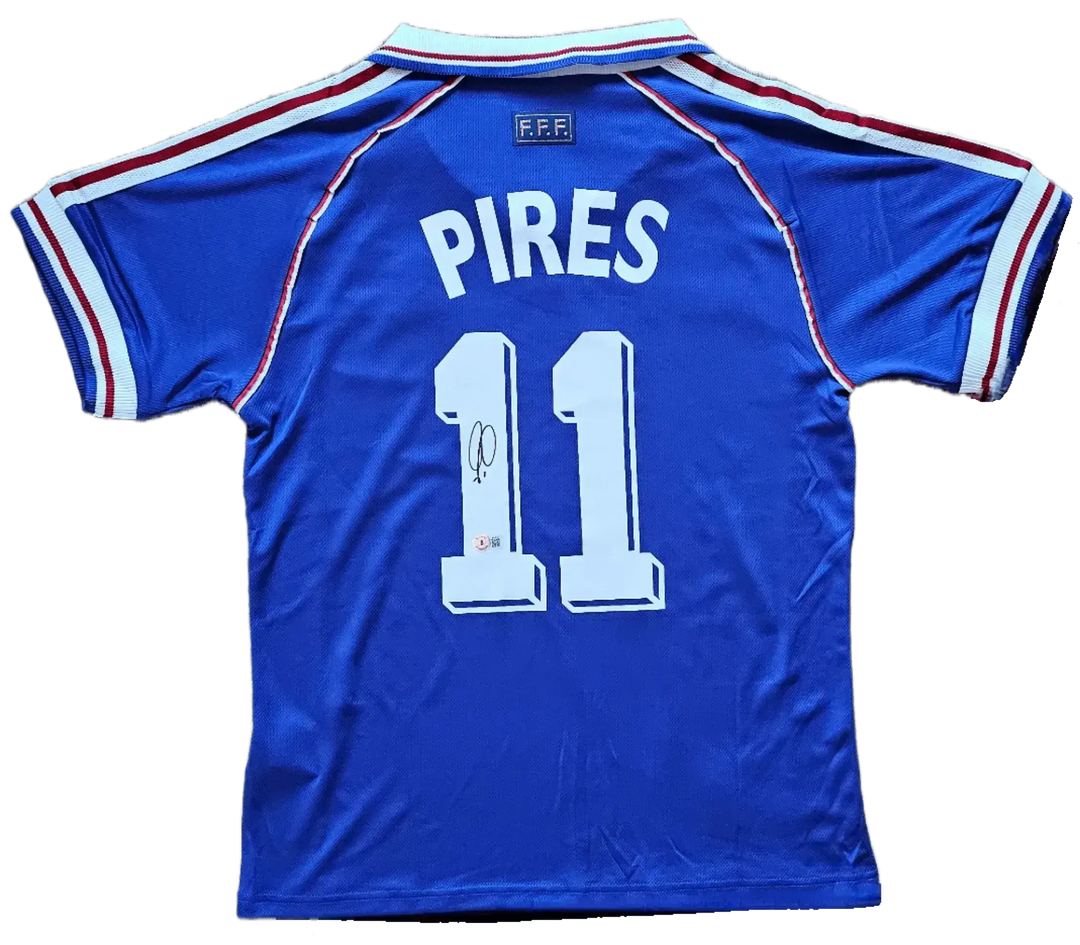 Back view featuring Pires, No. 11, and a visible signature detail on the soccer jersey.