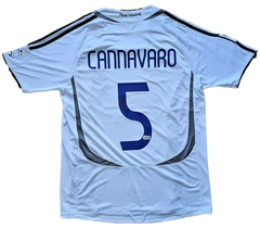 Back view showing Cannavaro, No. 5, with visible signature on the soccer jersey.