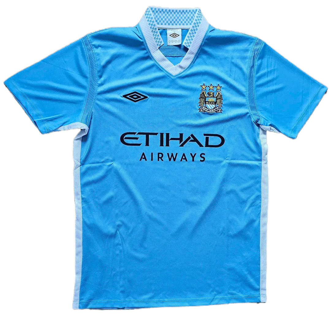 Front view featuring blue Manchester City F.C. soccer jersey with ETIHAD AIRWAYS and three stars.