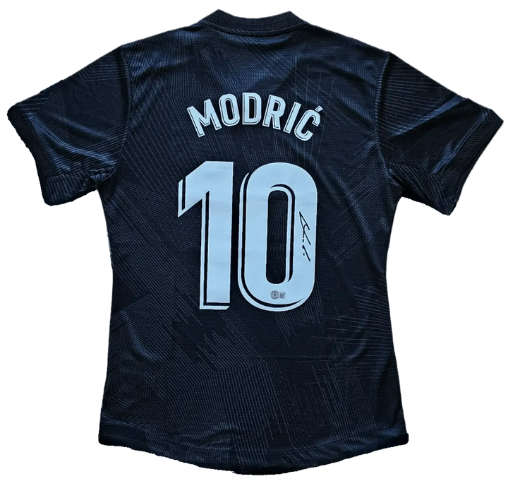 Back view showing No. 10, name MODRIĆ, and signature detail.