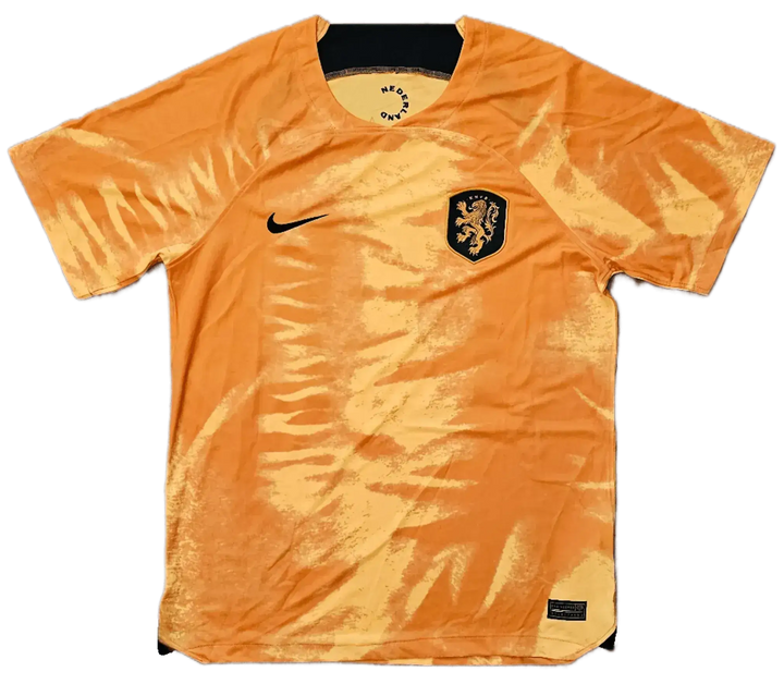 Front view showing Netherlands crest, Nike logo, and vibrant orange design of the signed football shirt.