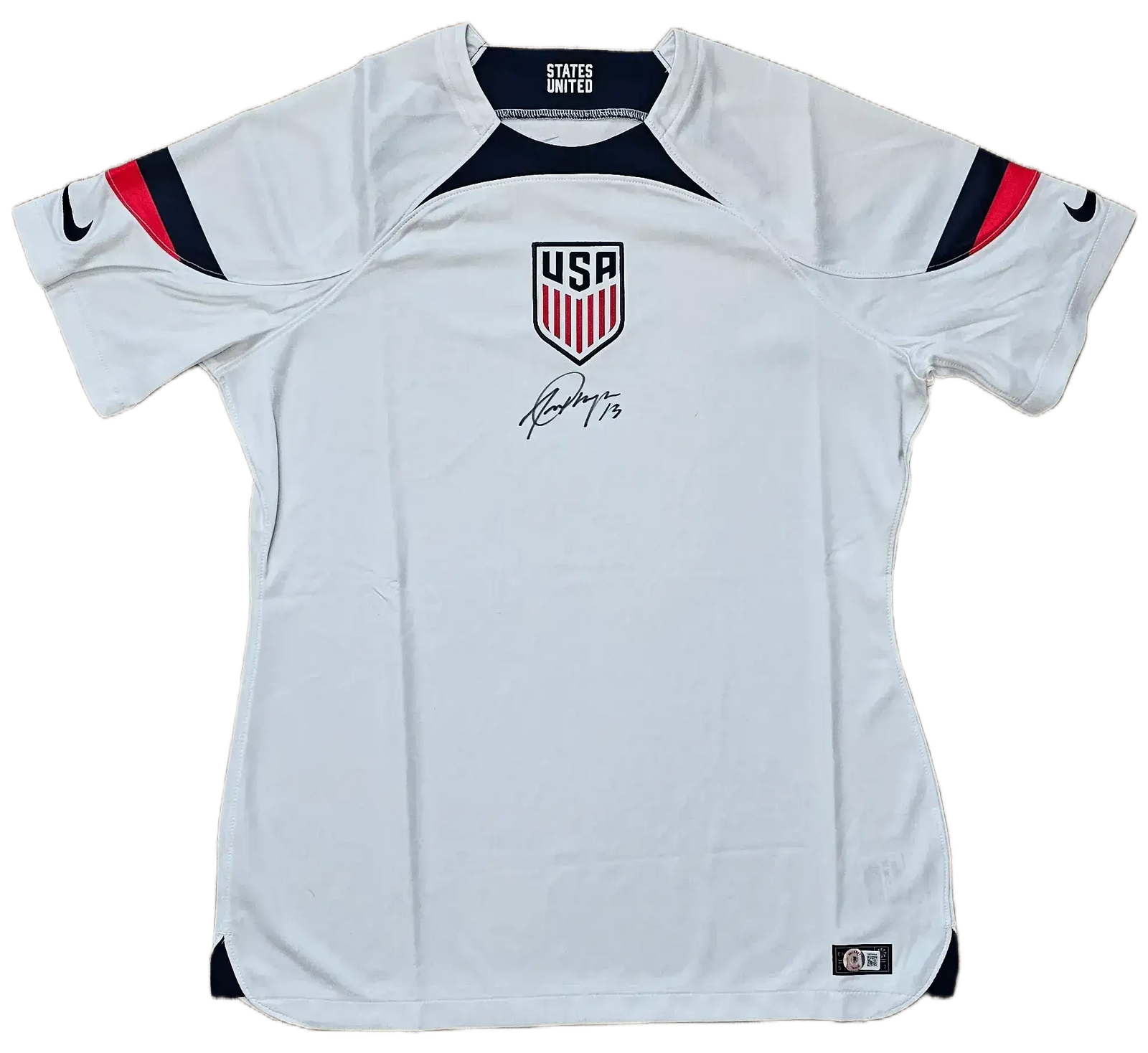 Front view of USA soccer jersey featuring crest, player name USA, and signature by Morgan.